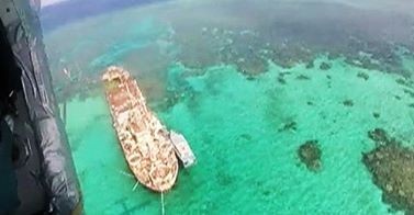 菲律宾出动飞机为侵占仁爱礁登陆舰空投补给