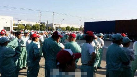 TOTO上海工厂罢工 日本国旗被降下