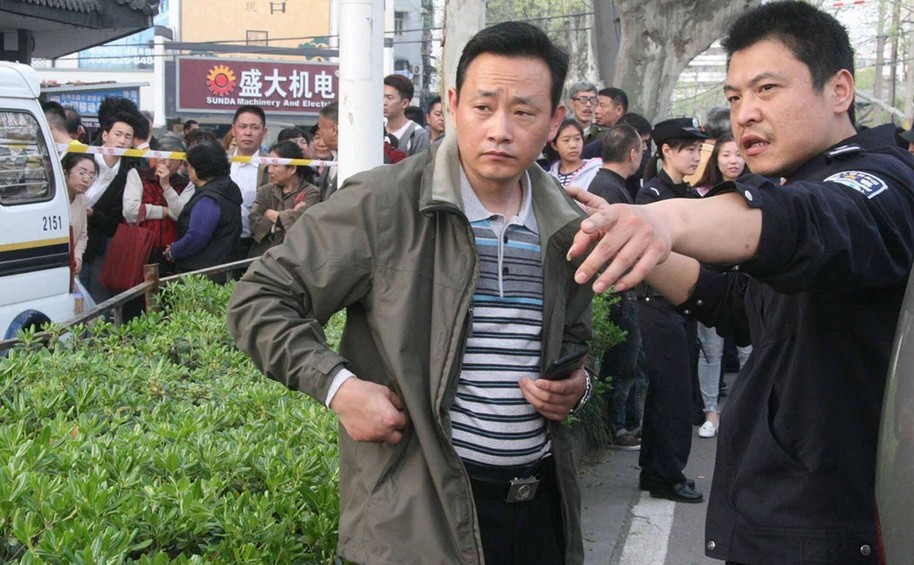 2014年4月3日，江苏省南京市，警察现场勘察。